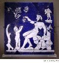Satyr Giving a Grapevine to Bacchus