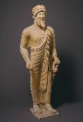 Statue of a Cyprus bearded man with votive offerings